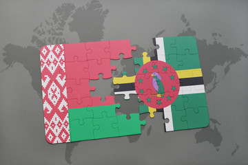 puzzle with the national flag of belarus and dominica on a world map