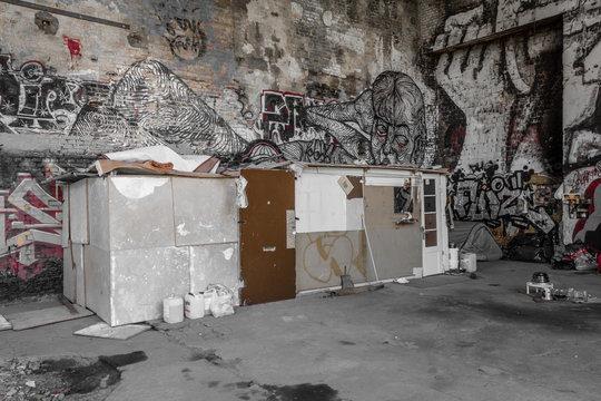 shelter of homeless people in abandoned factory building