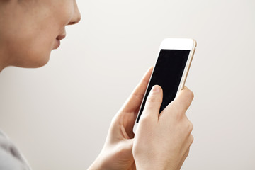 Young woman using mobile phone