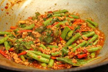 Cooking , Spicy fried cowpea with minced pork , Pad Ped Tua .