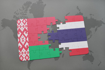 Fototapeta na wymiar puzzle with the national flag of belarus and thailand on a world map