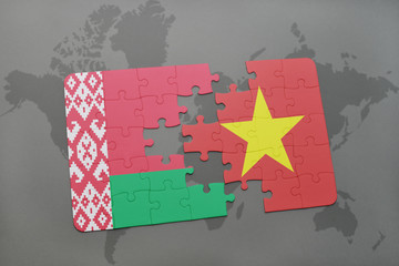 puzzle with the national flag of belarus and vietnam on a world map