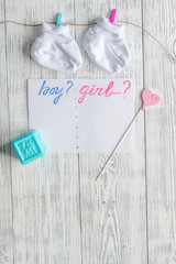 birth of child - baby shower concept on wooden background