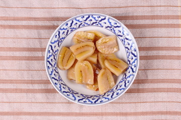 Ready served boiled banana in syrup call Klaui Chuam .