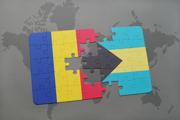 puzzle with the national flag of romania and bahamas on a world map