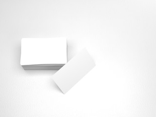 Stack of business cards. Namecards mockup template on white leather background. 3D Rendering