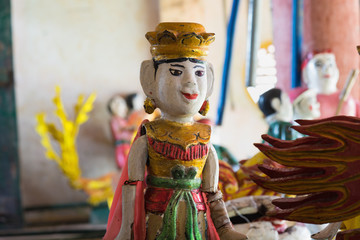 Common Vietnamese water puppets behind puppetry state. The control room is dark to hide puppeteers...