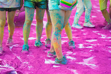 Colorful legs at public color run event in Hanoi capital city. Hundreds of people joined the joyful...