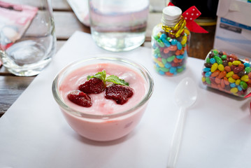 strawberry yogurt with strawberry  on wooden. strawberry yoghurt