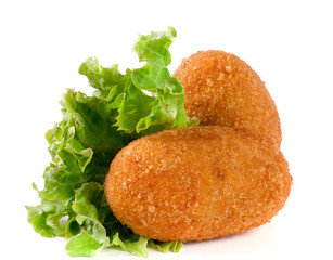 two fried breaded cutlet with lettuce isolated on white background