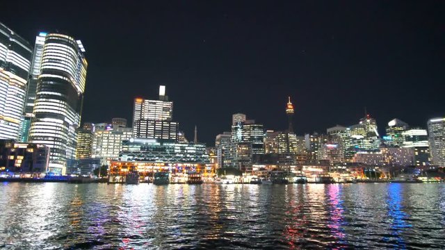 Moving shot of Darling Harbour of Sydney at night
