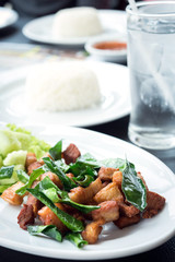 Deep fried pork with leech lime leaf and chili sauce