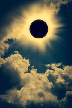 Natural phenomenon. Solar eclipse space with cloud on gold sky background