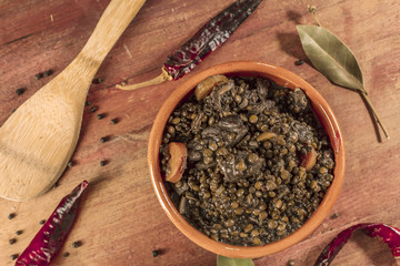 Lentil stew, shot from above, with bay leaves