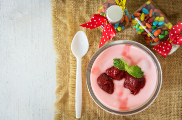 strawberry yogurt with strawberry  on wooden. strawberry yoghurt
