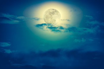 Naklejka na ściany i meble Nighttime sky with clouds and bright full moon with shiny.