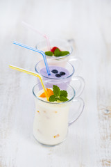 Smoothies or yogurt with fresh berries. Milkshakes with raspberr
