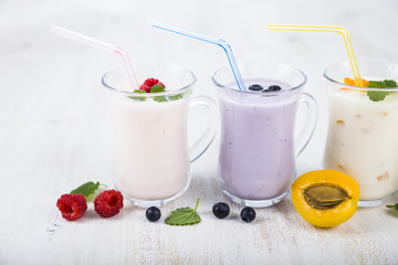 Smoothies or yogurt with fresh berries. Milkshakes with raspberr