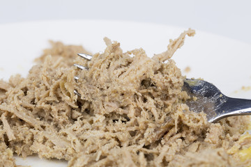 Fresh  Liver pate and fork on the plate.