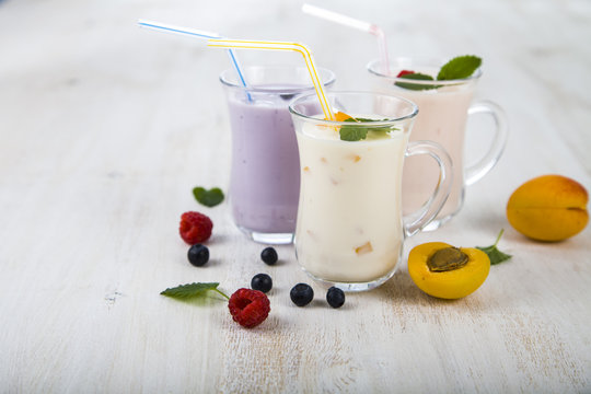 Smoothies or yogurt with fresh berries. Milkshakes with raspberr
