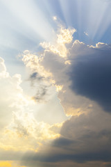 Fototapeta na wymiar Sunbeam on the cloud