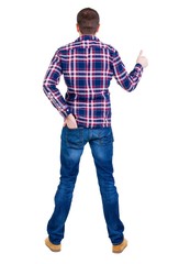 Back view of  man in checkered shirt shows thumbs up.