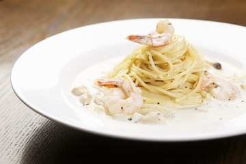 shrimp cream pasta on dish