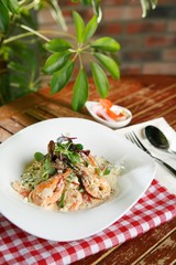 shrimp cream pasta on dish