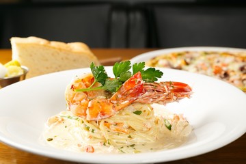 shrimp cream pasta on dish