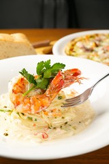 shrimp cream pasta on dish