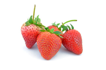 Collection of strawberry fruits of different shaped.