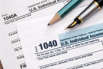 2017 tax form 1040 with pen.