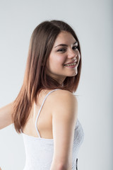 Fototapeta premium smiling young woman with a retainer