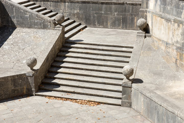 Old sandstone stairs in the park of Templar castle in Tomar, Portugal