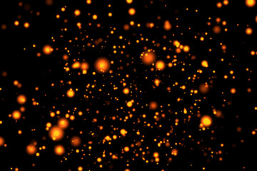 gold glow particles bokeh sparkle glittering on black background, holiday christmas new year...