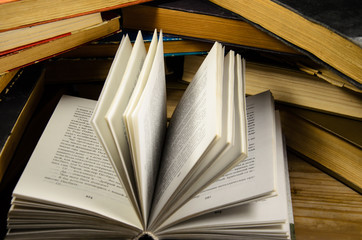 Open book on a wooden table