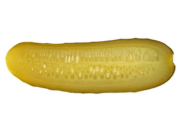 One pickled cucumber cut in half on white background