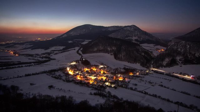 Time lapse Sunset to night with village mountain landscape