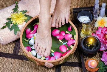 Obraz na płótnie Canvas Close up of a female feet in spa salon