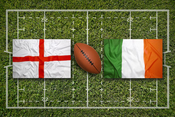 Obraz premium England vs. Ireland flags on rugby field