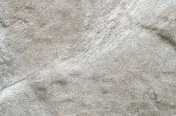 Closeup surface at stone pattern at stone brick wall in the garden textured background