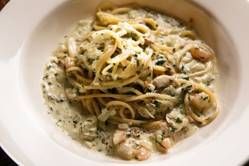 spinach cream pasta on table