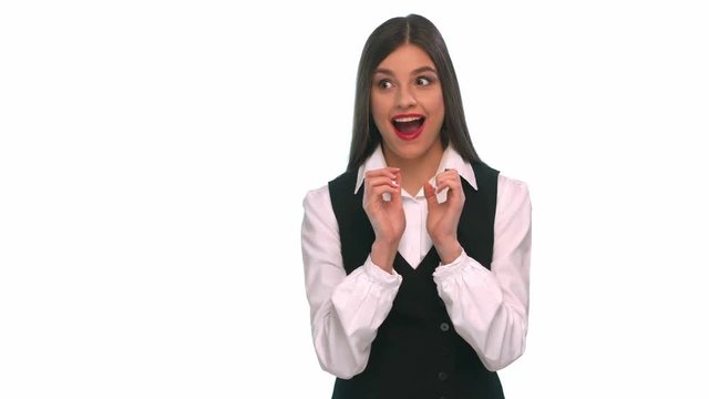 Girl in a business suit, plotting meanness on a white background