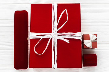 stylish red present and  and luxury jewelry  boxes on white rust