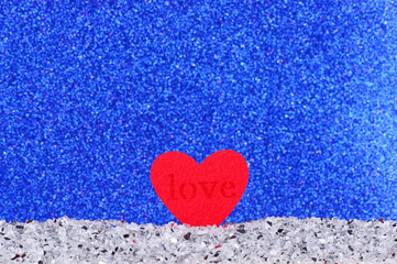 The red heart shapes on abstract light blue glitter background in love concept for valentines day and romantic moment