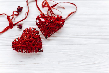 valentine concept. stylish hearts on white wooden background. ha