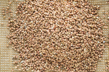 Buckwheat on the burlap. Healthy eating and lifestyle.