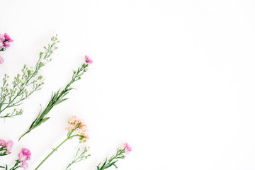 Colorful wildflowers on white background. Flat lay, top view. Valentine's background