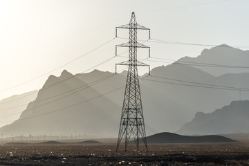 Electricity pylon on the road to Yazd city, Iran