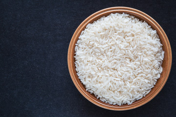 Rice on the dark background. Healthy eating and lifestyle.